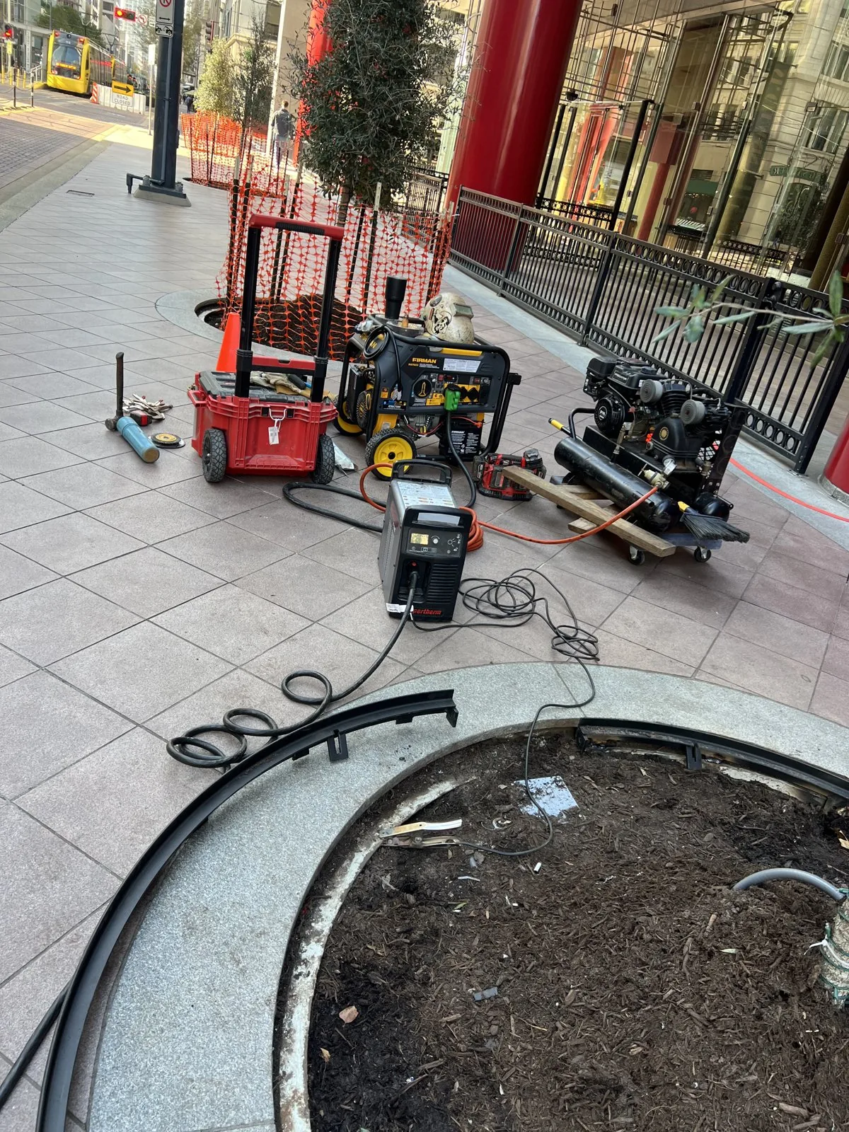 Mobile welding rig set up on a downtown job site