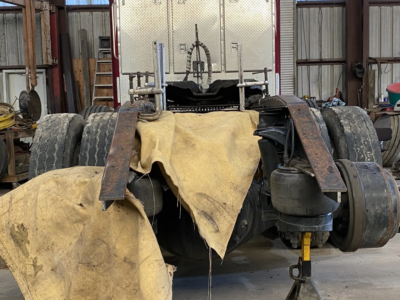 Rear suspension and axle repair on a heavy truck